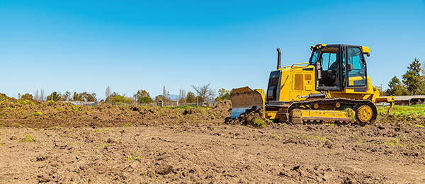Bull Dozer preparing area for construction Dirt Work