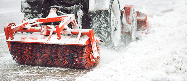 Removing snow from sidewalk during Winter Maintenance Winter Maintenance